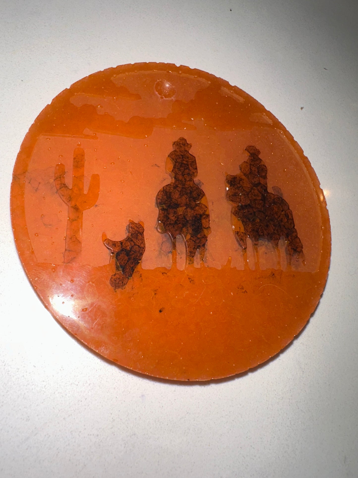 Orange cowboy emblem