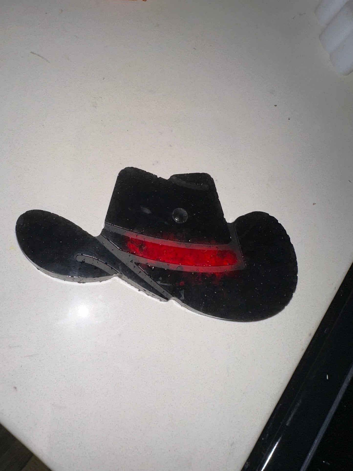 Black and red cowboy hat